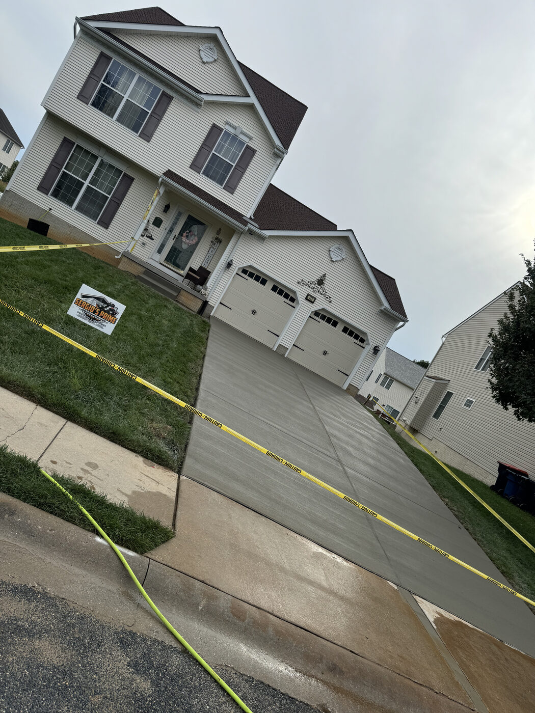 Concrete driveway for a two-car garage home